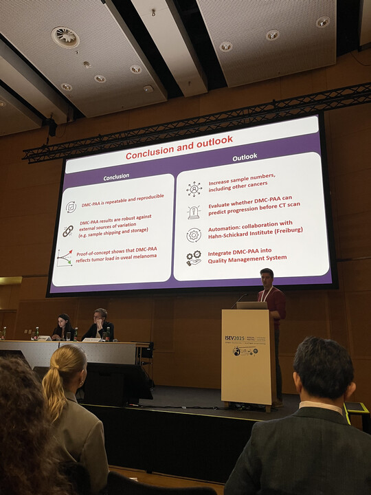 Dr. Jan Van Deun on stage at ISEV2025 during his presentation